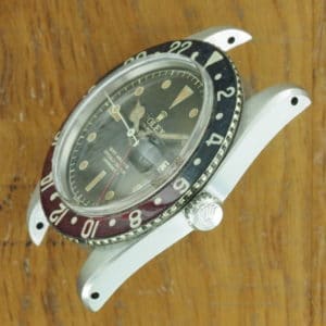 Right side of S/Steel Rolex GMT-Master tropical dial 6542 from 1958