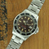 Front face of S/Steel Rolex Submariner tropical dial 1680 from 1969