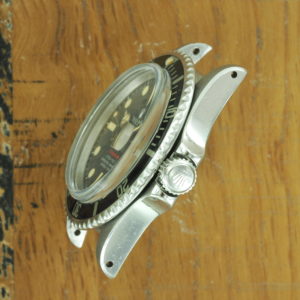 Right side of S/Steel Rolex Submariner tropical dial 1680 from 1969