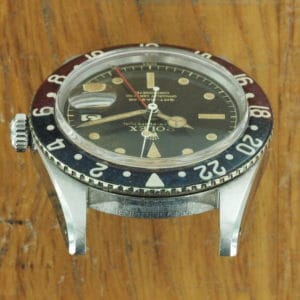 Top side of S/Steel Rolex GMT-Master tropical dial 6542 from 1958