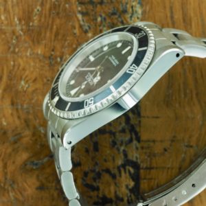 Left side of S/Steel Rolex Submariner 14060 from 1991
