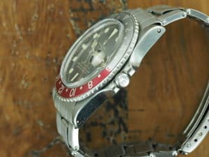 Right side of S/Steel Rolex GMT-Master gilt dial 1675 from 1966