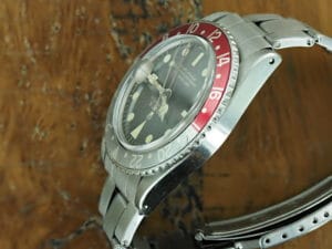Left side of S/Steel Rolex GMT-Master gilt dial 1675 from 1966