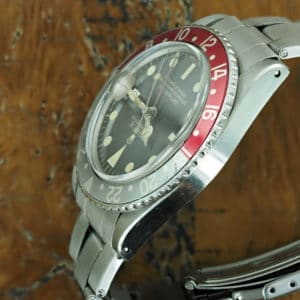 Left side of S/Steel Rolex GMT-Master gilt dial 1675 from 1966