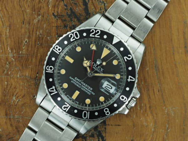 Front face of S/Steel Rolex GMT-Master black insert 1675 from 1978