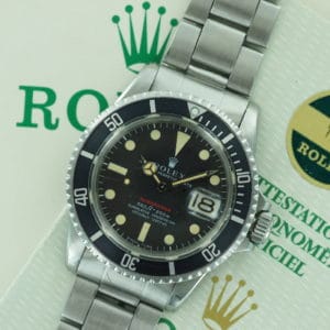 Front face of S/Steel Rolex "red" Submariner from 1972 with papers