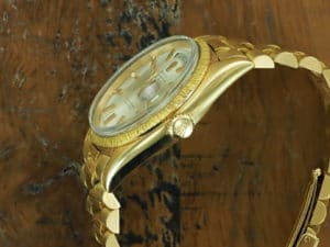 Bottom side of 18K Rolex Day-Date bark finish 1807 from 1967