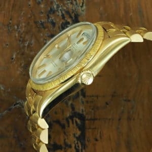 Bottom side of 18K Rolex Day-Date bark finish 1807 from 1967