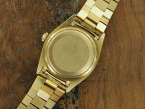 Back side of 18K Rolex Day-Date bark finish 1807 from 1967