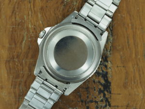 Back side of S/Steel Rolex GMT-Master pcg chapter ring gilt dial from 1962
