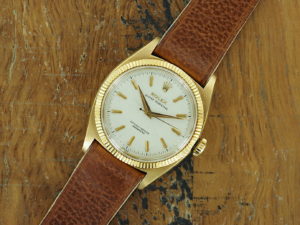 Front face of 18K Rolex Oyster Perpetual Honeycomb dial ref 6502 from 1955