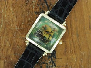 Front face of 18K Eska automatic "cioccolatone" with Stern Frères Cloisonné dial
