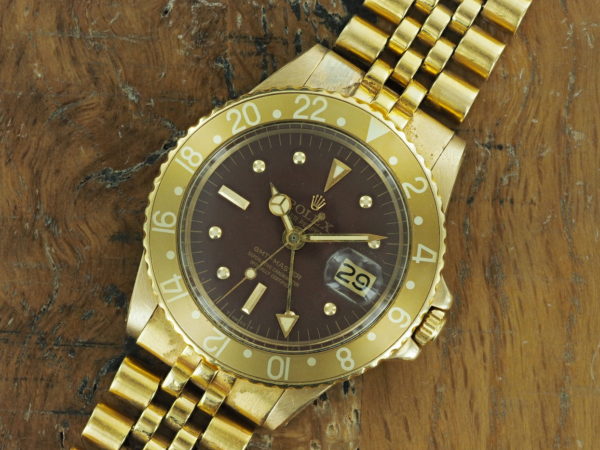 Front face of 1971 18K Rolex brown matte dial GMT-Master ref 1675