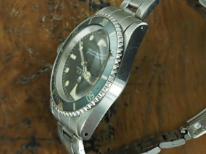 Left side of 1969 S/Steel Rolex Submariner "meters first" ref 5513
