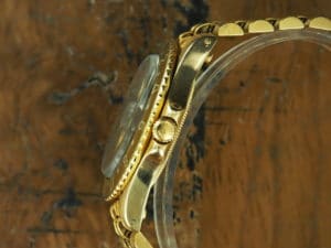 Right side of 1971 18K Rolex brown matte dial GMT-Master ref 1675