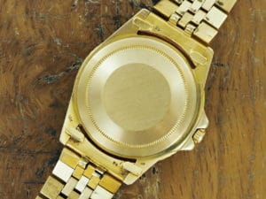 Back side of 1971 18K Rolex brown matte dial GMT-Master ref 1675