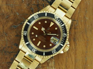 Front face of 1986 18K Rolex Submariner tropical dial 1680