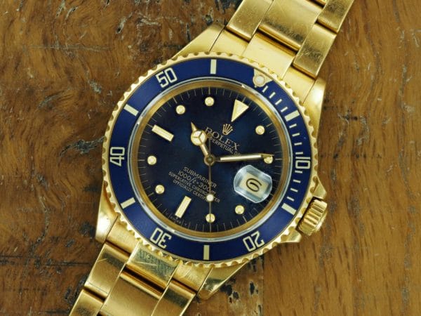 Front face of 1986 18K Rolex Submariner transitional dial 16808