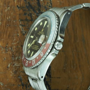 Right side of 1965 S/Steel Rolex GMT Master gilt dial Ref 1675