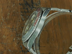 Left side of 1965 S/Steel Rolex GMT Master gilt dial Ref 1675