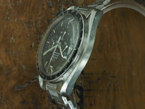 Full left side of S/Steel Omega tropical Speedmaster pre-moon 145022 69ST