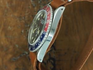 Full left side of 1968 S/Steel Rolex GMT-Master ref 1675
