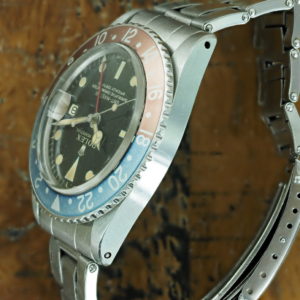 Full left side of 1966 S/Steel Rolex gilt GMT-Master ref 1675